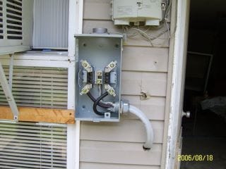 Newly installed exterior meter socket on a house